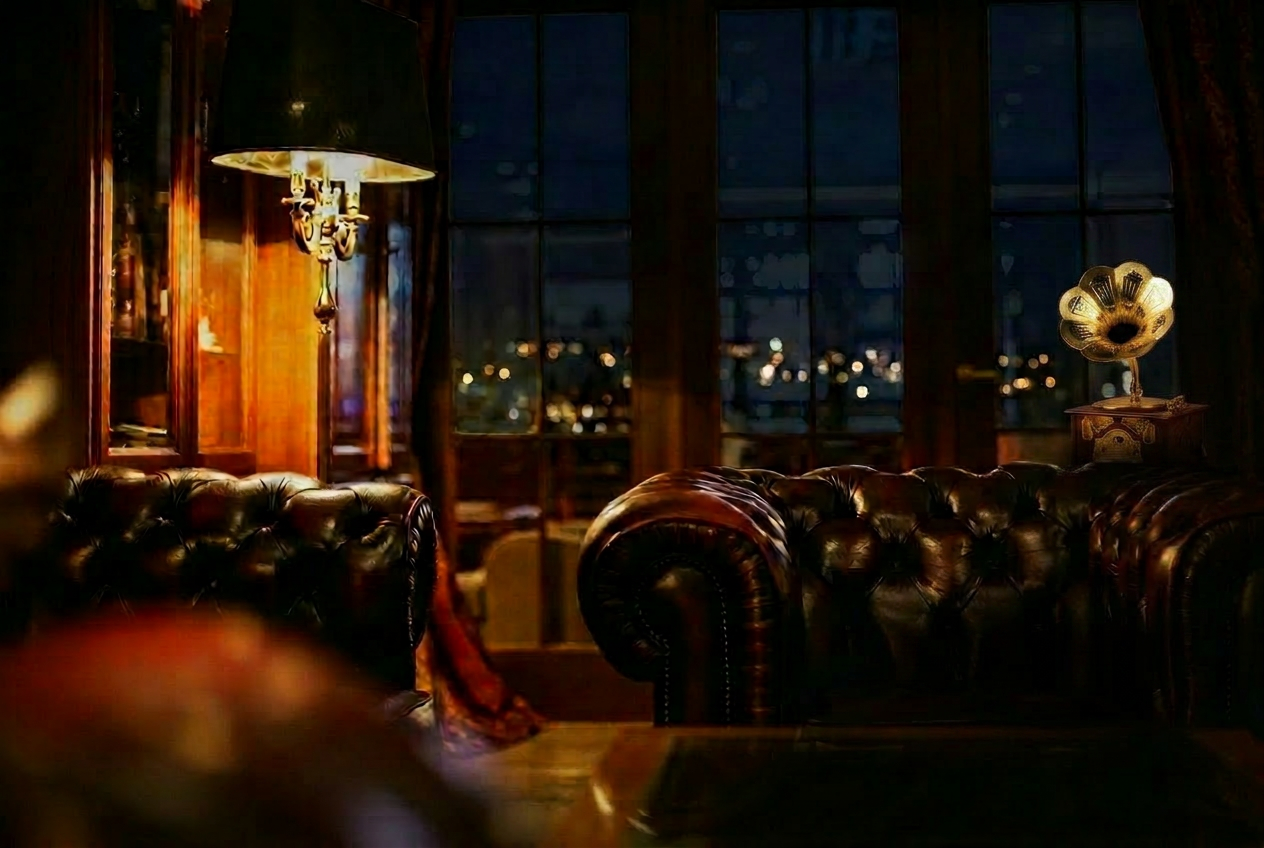 Maison Jaéld private lounge at night with antique gold gramophone